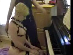 The Handcuffed Piano Slave