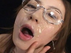 Kokoro Amano sucked dicks and took 150 bukkake cumshots on her face and in her face gap  ate cum on food and collected cum in a bottle and drank it all down.