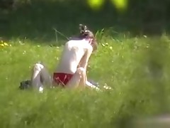 A creeper in the bushes catches a stripped couple fucking in the park with his cam. Their stripped bodies acquire it on and enjoy their sex out of a care in the world or the slightest suspicion that someone may be lurking.